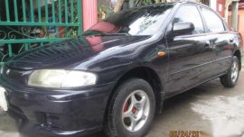 Mazda 323 1.4 1997 MT Blue Sedan For Sale
