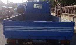Isuzu ELF 14ft dropside flat bed truck slightly negotiable