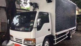 Isuzu elf closed van 6wheeler for sale
