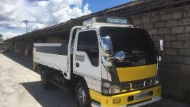 Isuzu Elf 12ft 4HL1 MT White Truck For Sale