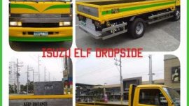 Isuzu elf dropside and isuzu elf close van