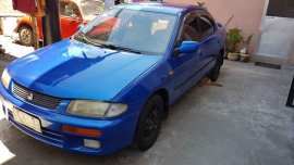Mazda 323 1997 sedan blue for sale 