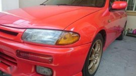 Mazda 323 1996 MT Red Sedan For Sale