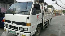 Fresh Isuzu Elf 12ft MT White Truck For Sale