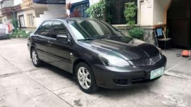 2009 Mitsubishi Lancer GLS - AT (alt for city vios altis mazda)