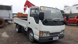 surplus japan isuzu elf dropside with mini crane