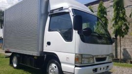 Isuzu Elf Aluminum Van 10ft Isuzu Canter dropside cargo