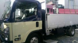 Isuzu Elf NPR Drop Side 14ft MT Yellow For Sale