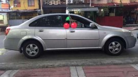 Chevrolet 2005 Optra sedan silver for sale 