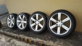 Mitsubishi Euro oem wheels 22x9 Nitto NT420s 275 40 22 tires