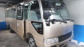 2013 Toyota Coaster Gliding Door Dubai Version Beige for sale