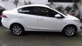 Mazda 2 2010 sedan white for sale 