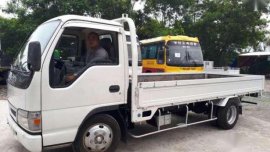 Isuzu elf truck dropside 4HL1 14ft for sale 