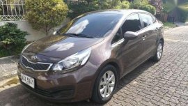 Kia Rio 2014 EX MT Brown Sedan For Sale