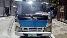 Izusu elf 10ft truck blue for sale 