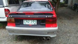 toyota super custom van and mitsubishi lancer