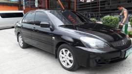 For sale Black Mitsubishi Lancer 2009