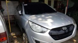 Hyundai Tucson crdi diesel engine automatic transmission.