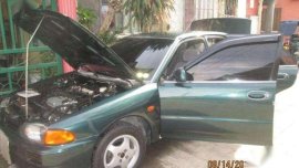 MITsubishi lancer glxi and YAMaha Mio sporty