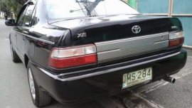 Black Corolla 1.3 Manual Aircon