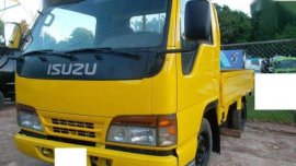 Isuzu Elf Dropside Cargo Truck and Toyota Ace Dropside