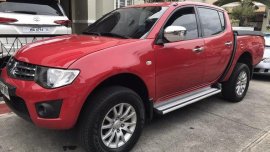 FOR SALE RED Mitsubishi Strada 2014