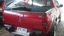 FOR SALE RED Mitsubishi Strada 2008