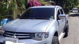 Mitsubishi strada silver for sale