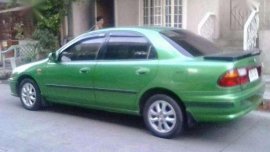 Lady-owned Mazda 323 Familia 1997 Model for sale 