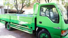 Isuzu Elf Dropside GIGA for sale 