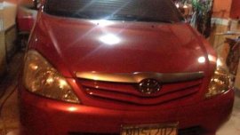 Toyota Innova j 2010 Van red for sale 