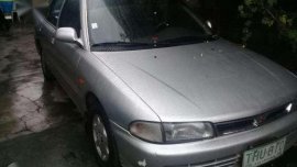Mitsubishi GLXI sedan silver for sale 