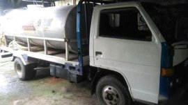 Elf nkr Water truck tank tanker diesel not fuso dyna dropside flat bd