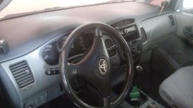 Toyota innova diesel Van red for sale 