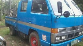 Rush sale Isuzu Elf blue color