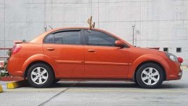 Kia Rio 1.4 AT Sunset Orange 2010 For Sale 