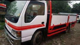 isuzu elf giga npr 15ft dropside with lifter