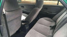 Mitsubishi lancer green 95 model