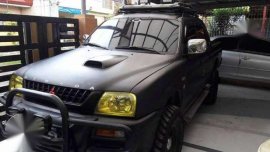 Mitsubishi Strada 2002 4WD 2.5 MT Gray For Sale 