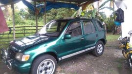 For sale green color Kia Sportage 2007