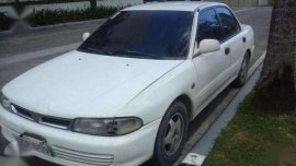 White Car-Mitsubishi Lancer 1995 mdl for sale 