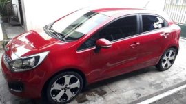 Kia Rio 1.4 Hatchback AT 2012 Red For Sale 