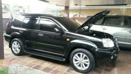 Nissan XTrail 2004 model black for sale 