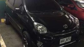 Rush sale Toyota Wigo 2014 AT Black Low mileage 