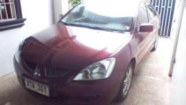 Mitsubishi Lancer 2004 mdl red for sale 