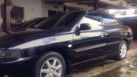 Mitsubishi Lancer 2002 MT Black Sedan For Sale 