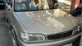 Toyota Corolla 2000 MT Beige Sedan For Sale 