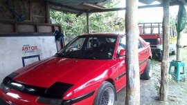 Mazda 323 1994 red for sale