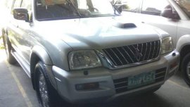 Mitsubishi Strada 2004 silver for sale