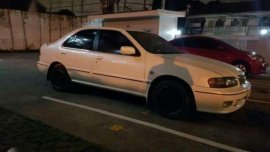 Nissan Exalta STA 2000 AT White Sedan For Sale 